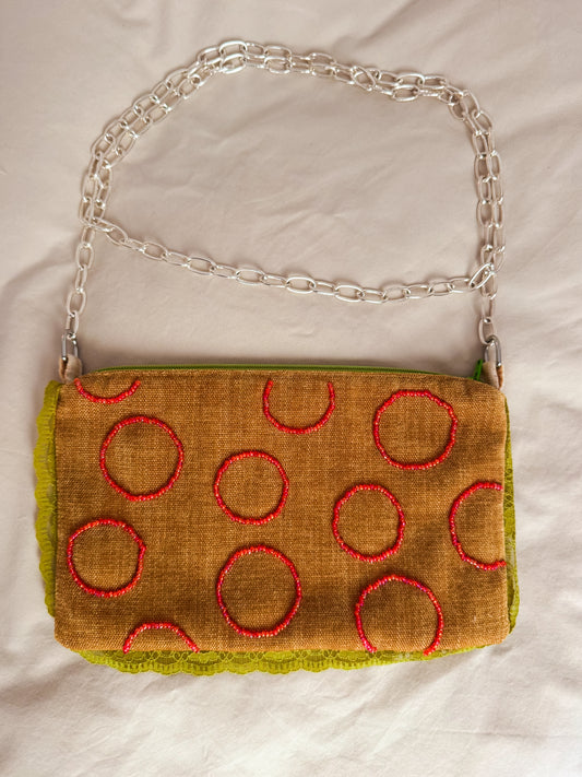 Reversible cross body pouch